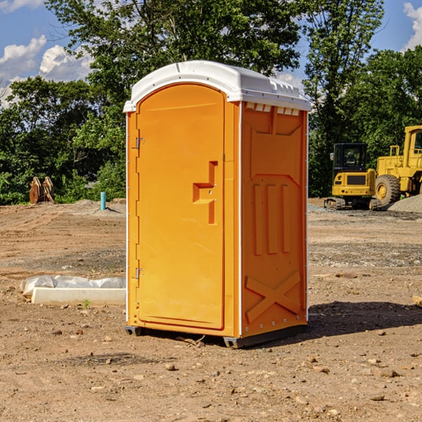 what is the cost difference between standard and deluxe portable toilet rentals in Moorcroft